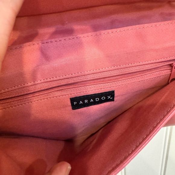 Paradox Pink Leather Bow Shoulder Purse. 10” by 6” by 0.5” with strap drop 13” - Picture 5 of 7